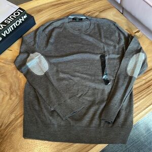 Great condition, never worn merino wool sweater
